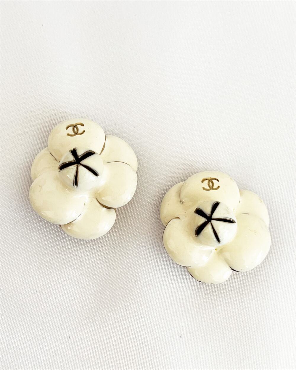 CHANEL Camellia Clip On Earrings White Enamel Flower GoldTone CC Logo Circa 2002